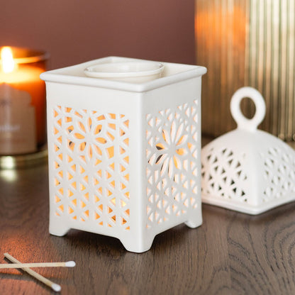 Decorative ceramic lantern fragrance burner with intricate cut-out design by Especially Scent