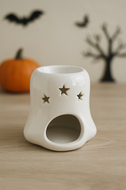 Halloween ghost oil burner with tealight opening and star cutouts