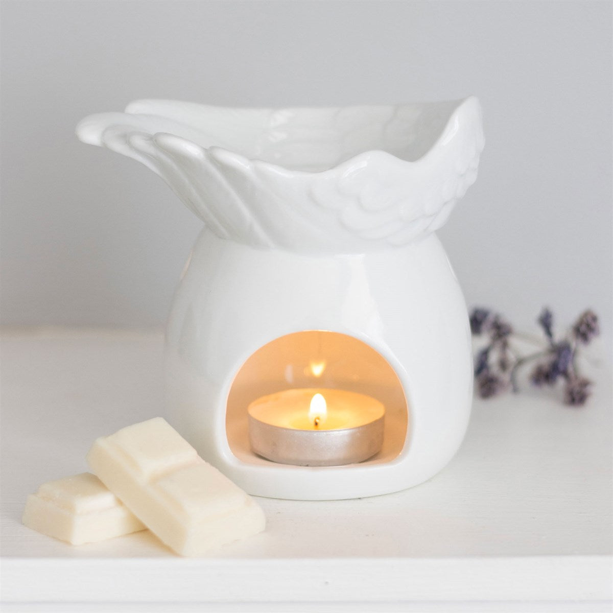 Angel Wing Dish ceramic oil burner and wax melt warmer with sculpted white angel wing design
