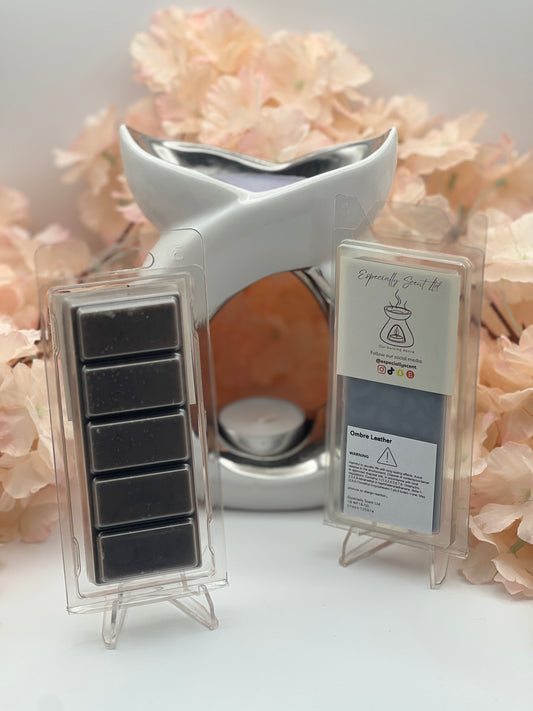 Hand-poured wax melt in a stylish clamshell container, designed to fill your space with a long-lasting, luxurious fragrance. Ideal for use in wax warmers to create a cozy and inviting atmosphere. Scent notes include: A rich sensual leather fragrance with suede fused with precious woods of sandalwood, patchouli, velvet woods, tobacco and amber. These are harmonised with violet, regal iris, musk and jasmine.