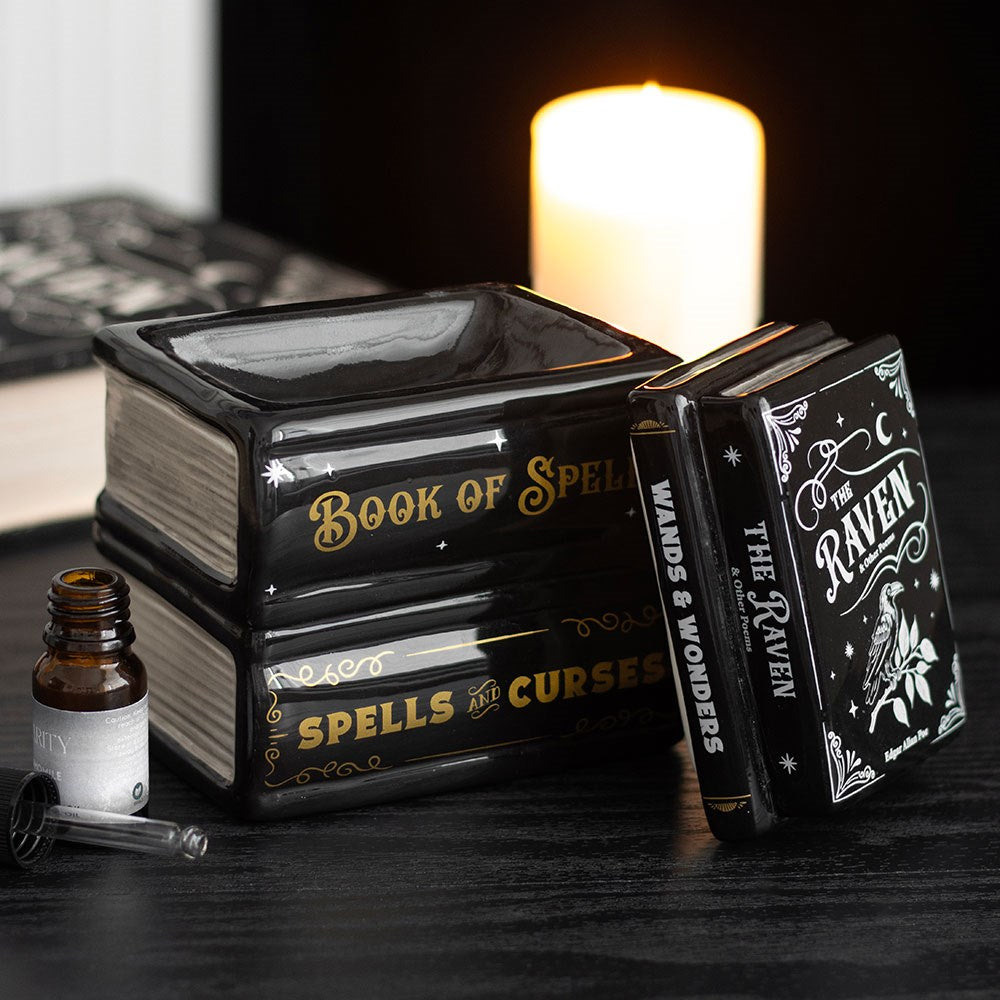 Decorative Book of Spells oil burner and wax warmer, ideal for melting scented wax melts and adding a magical touch to gothic and witchy home interiors.