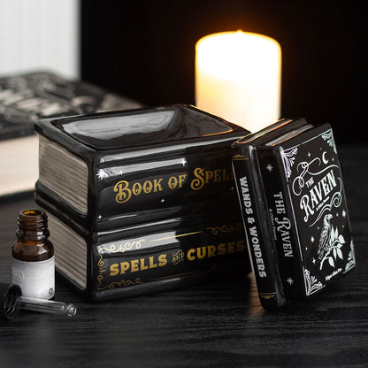 Decorative Book of Spells oil burner and wax warmer, ideal for melting scented wax melts and adding a magical touch to gothic and witchy home interiors.