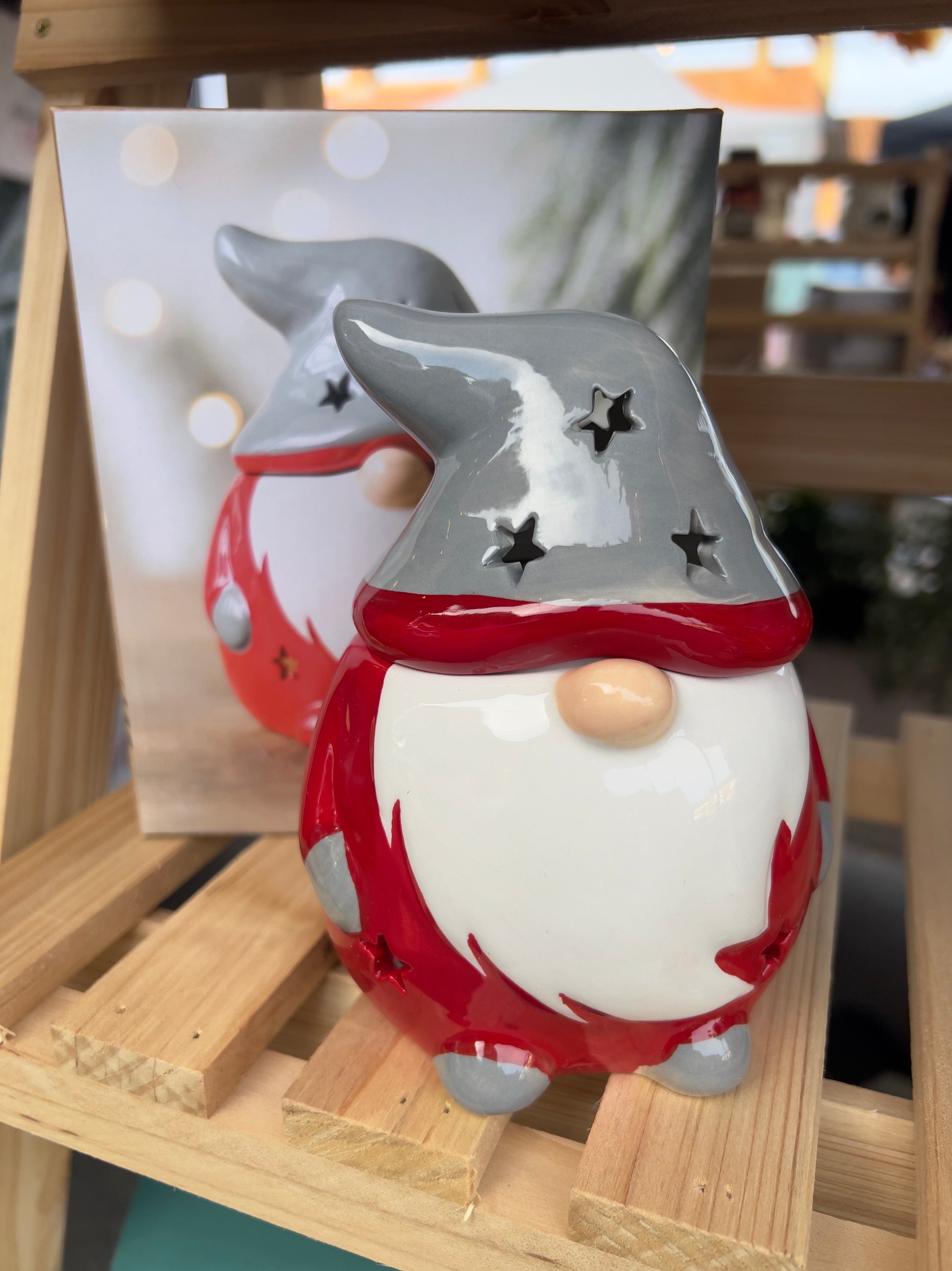 Santa Gonk Christmas wax melt and oil burner with festive ceramic design, red and white outfit, and star-cutout grey hat for cozy holiday home décor.