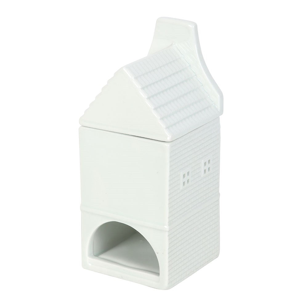 Nordic white ceramic wax melt burner styled as a miniature house for Scandi home décor