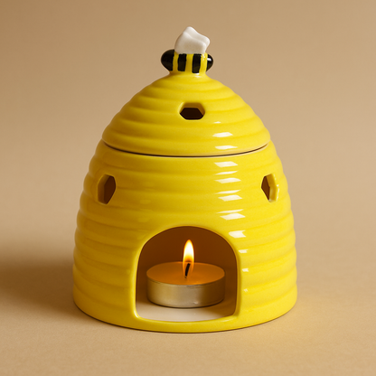 Yellow beehive ceramic wax melt and oil burner with tealight lit
